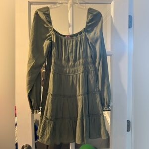 Francesca’s long-sleeved green dress